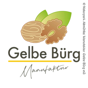 Logo Manufaktur Gelbe Bürg Bild von gezeichneter Walnuss mit Kern und Blatt. Darunter Schriftzug in Schwarzer Farbe Gelbe Bürg.